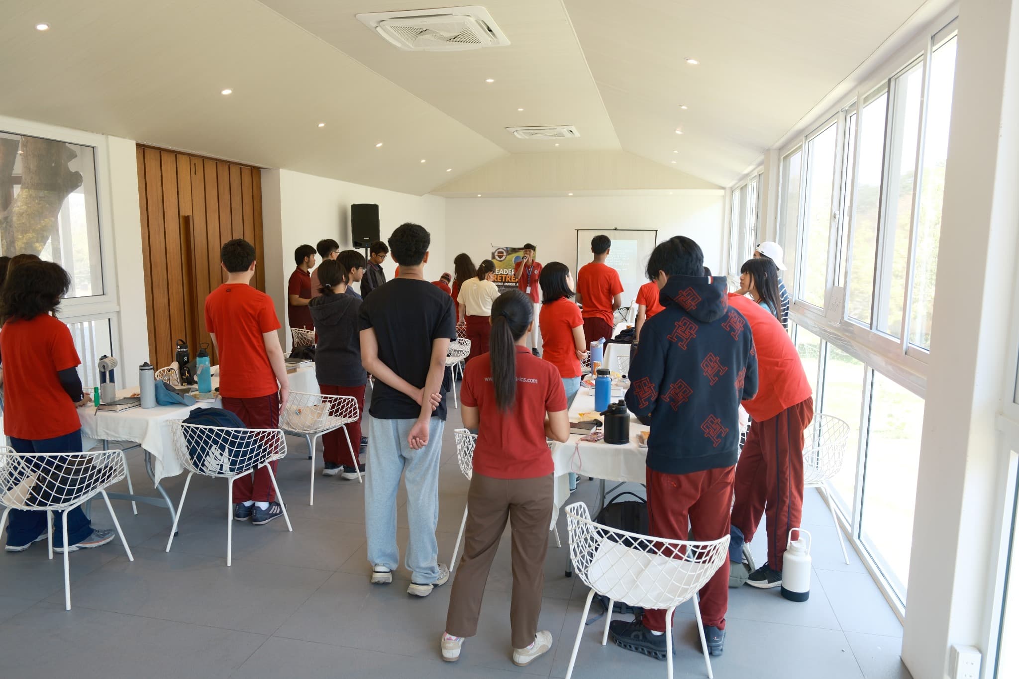 LICSM students participating together during a chapel gathering.