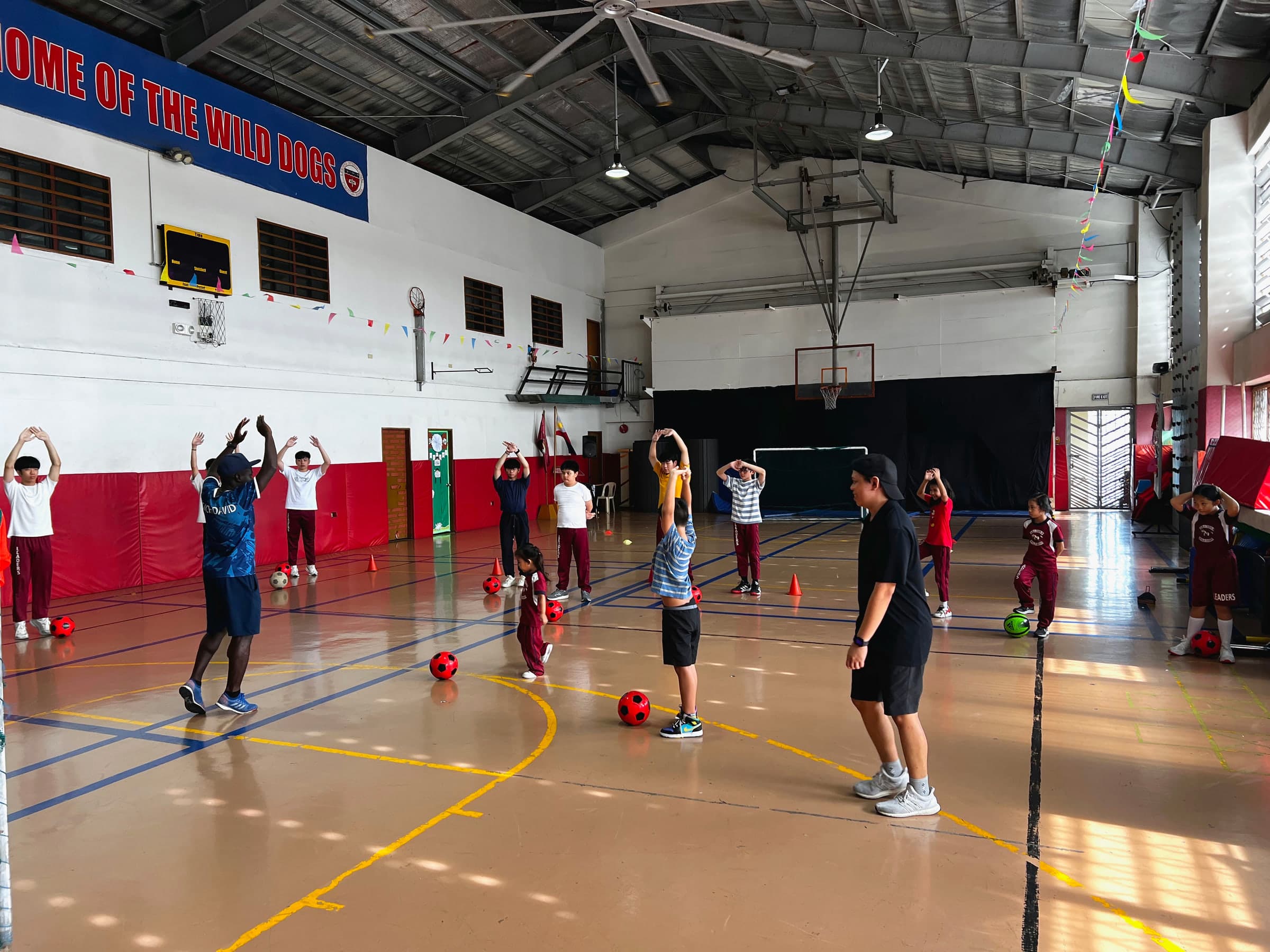 Students at Leaders taking part in a guided futsal training session.