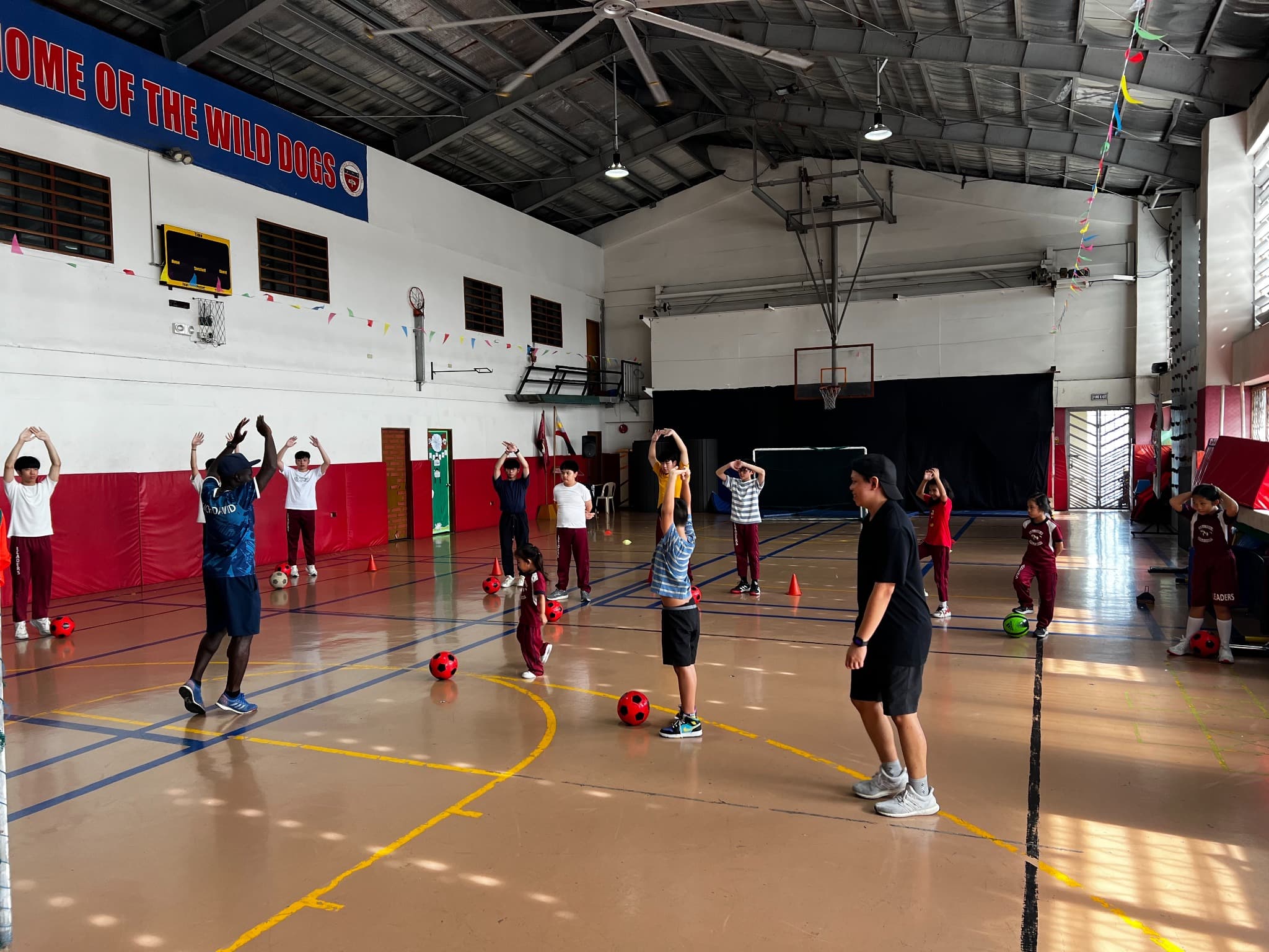 LICSM students taking part in a guided futsal training session.