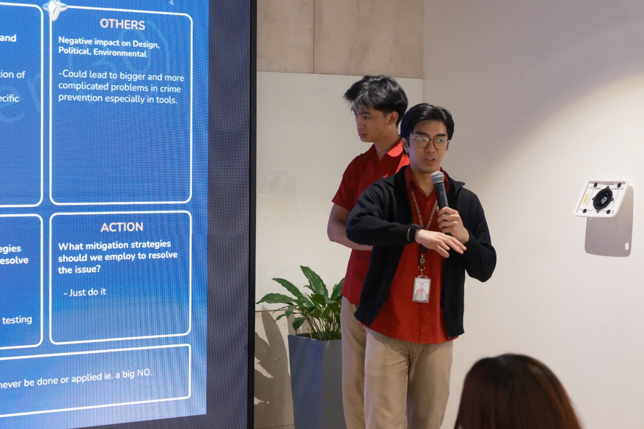 An LICSM student presenting a project to classmates.